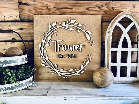 Wooden family name sign