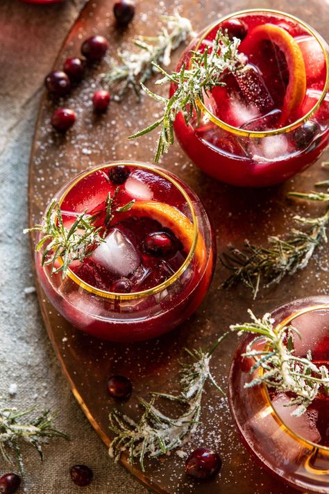 Cranberry Bourbon Sour | halfbakedharvest.com #bourbon #thanksgiving #cocktails #holiday #christmas Sangria Photoshoot, Holiday Sangria Recipes, Batch Cocktail Recipe, Cocktails Easy, Festive Holiday Drinks, Bourbon Sour, Holiday Sangria, Holiday Shoot, Modern Proper