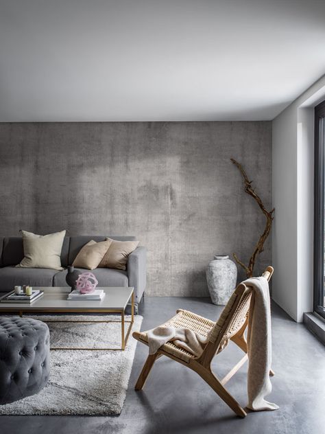 Coloured+in+shades+of+warm+grey+with+a+hazy+blueish+undertone,+our+Concrete+Wall+wallpaper+is+the+ideal+choice+for+a+really+authentic+and+on-trend+look+for+modern+interiors.+The+mural+is+repeatable+sideways,+making+it+perfect+for+adding+an+urban+edge+to+industrial+style+interiors.+Hang+it+in+your+kitchen,+dining+room,+or+office+area+for+a+look+that+is+effortlessly+on+trend.+The+original+mural+is+(W)360cm+x+(H)300cm.  	  	How+would+Concrete+Wall+complement+your+styling?+Easily+order+a+free+sample Concrete Wall Living Room, Masculine Decor Living Room, Concrete Walls Interior, Concrete Living Room, Concrete Wall Design, Concrete Interior Design, Masculine Living Rooms, Look Wallpaper, Concrete Interiors