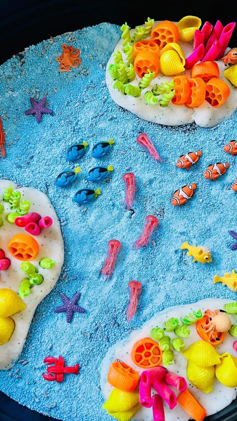 Ocean Messy Play, Pasta Coral Reef, Mermaid Sensory Play, Ocean Playdough, Mermaid Sensory, Coloured Pasta, Diorama Kids, Sensory Bin Play, Diy Sensory Board