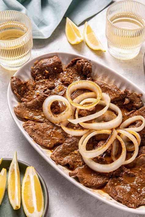 Bistek is a Flavorful Filipino Classic That’s Easy to Make Filipino Bistek Recipe, Filipino Bistek, Bistek Recipe, Filipino Dish, Beef Sirloin, Filipino Dishes, Pinoy Food, Braised Beef, Skirt Steak