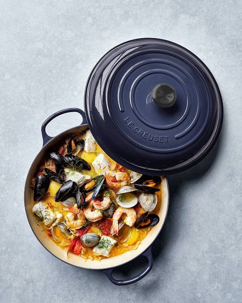 Weeknight Bouillabaisse | Crate & Barrel French Fish Soup, Bouillabaisse Recipe, Cast Iron Braiser, Fish Soup, Large Shrimp, Yukon Gold Potatoes, Dry White Wine, Enameled Cast Iron, Cooking Method