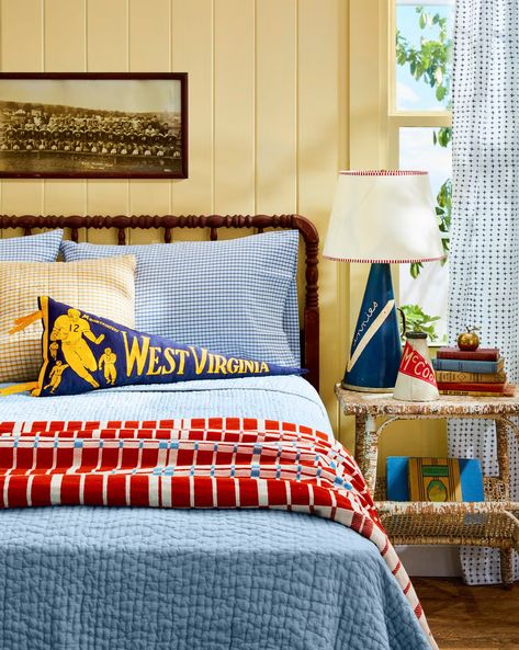 yellow bedroom with college memorabilia decor Best Yellow Paint Colors, Boys Bedroom Paint Color, Yellow Boys Room, Boys Bedroom Paint, Country Living Fair, Yellow Paint Colors, Sunny Disposition, Nautical Bedroom, Yellow Paint