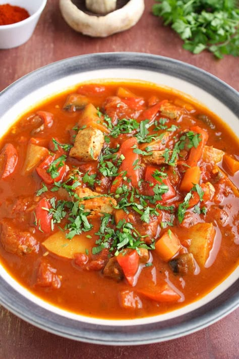 Feeling Hungary? Get a load of this vegan goulash. Featuring paprika, potatoes, smoked tofu, and portobello mushrooms, it's a supremely tasty one-pot meal that's healthy, hearty, low-fat, and gluten-free. #HalfYourPlate #Goulash #Vegan #VeganGoulash Vegan Hungarian Goulash, Hungarian Stew, Goulash Vegan, Vegetarian Goulash, Mushroom Goulash, Vegan Goulash, Smoked Tofu, Healthy One Pot Meals, Goulash Recipe