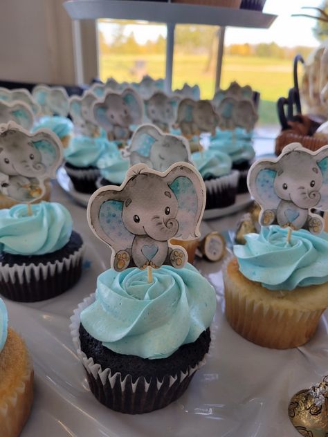 Picks purchased on Amazon. Local baker made cupcakes and with them being 'no frills' they saved a little dough 😁 Elephant Theme Cupcakes, Cupcake Baby Shower Boy, Dessert Baby Shower Ideas, Elephant Dessert Table, Baby Shower Elephant Theme Boy, Baby Shower Boy Cupcakes, Elephant Baby Shower Theme Boy, Baby Shower Cupcakes For Boy, Elephant Cupcakes