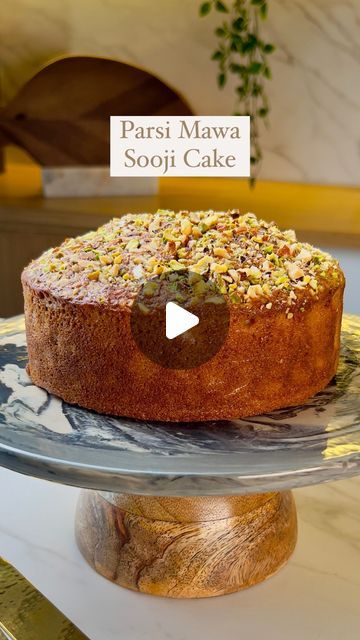 Guntas Sethi on Instagram: "✨Parsi Eggless Sooji Mawa Cake✨  Nothing screams nostalgia better than Parsi eggless sooji mawa cake and this recipe makes for the most scrumptious, moist and soft cake at home that is a delight in every bite✨😋  I got all my ingredients sorted from @ellementryhome that add style and elegance to my kitchen❤  Recipe: -2 tbsp custard powder -1.5 cups warm milk -1.5 tsp vinegar -1/2 cup Maida  -100 grams Mawa  - 3/4 cup superfine rawa  -1/2 cup + 2 tbsp caster sugar -1/2 tsp baking soda -1 tsp baking powder -1/4 tsp elaichi powder - 4 tbsp melted ghee/butter  For the Mawa:   - 2 tbsp Butter  - 1/4 cup Milk  - 1 cup Milk Powder  🍰Chopped Nuts as needed for topping  🍰Bake is at 180 degrees for 40-45 mins or until done.   [chef guntas, chef g, home made, home recipe Sooji Cake Recipe, Maida Cake Recipe, Eggless Tea Cake Recipe, Mawa Cake Recipe, Custard Powder Recipes, Home Made Cake, Butter Cakes, Cake At Home, Dessert Cups Recipes