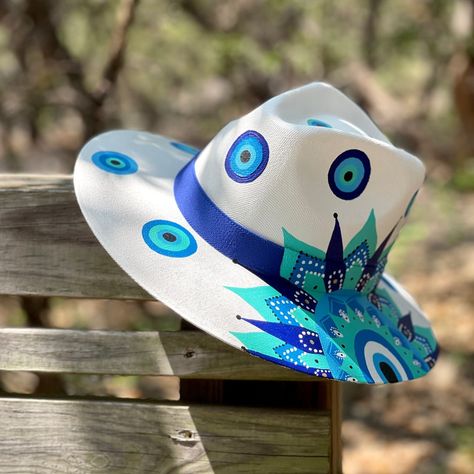 This Sun Hats item by Bootsologie has 51 favorites from Etsy shoppers. Ships from United States. Listed on 03 Aug, 2023 Painted Hats For Women, Mexican Mandala, Decorated Hats, Hand Painted Hats, Evil Eye Hand, Hats Ideas, Canvas Hat, Mexican Hat, High Tea Party