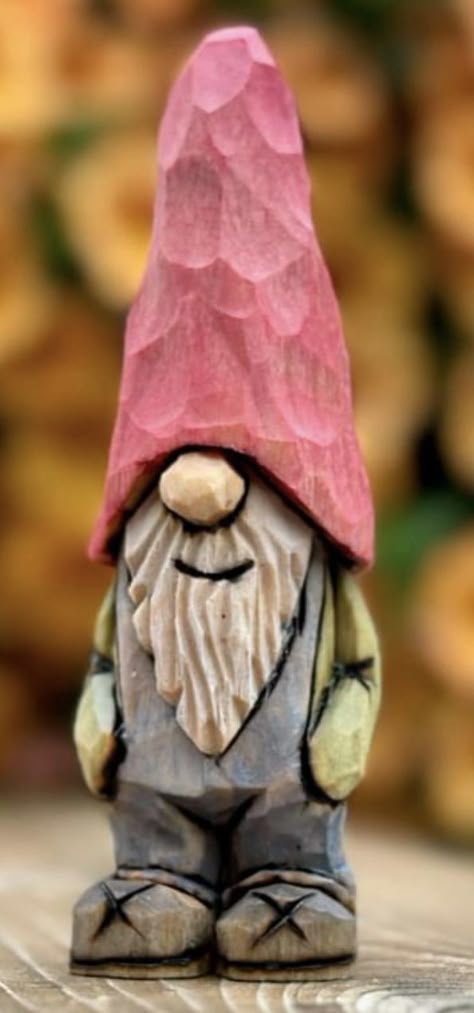 Gnome Chainsaw Carving, Chainsaw Carving Ideas, Carved Gnomes, Gnome Carving, Elf Carving, Clay Gnomes, Wooden Feather, Chainsaw Wood Carving, Wood Log Crafts