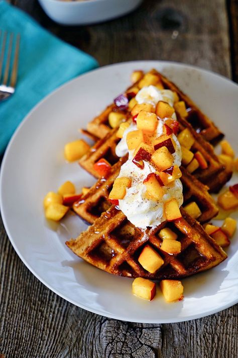 Date Honey Bran Waffles with Cinnamon Peaches - these are not too dense, have a wonderful texture and the buttermilk counters the sweet honey and dates. Topping this off are diced, fresh peaches mixed with honey, lemon and a little cinnamon. Bran Waffles, Peach Waffles, Cinnamon Peaches, Date Honey, Waffle Day, Crepes And Waffles, Bakery Style Muffins, Fresh Peaches, Homemade Pancakes