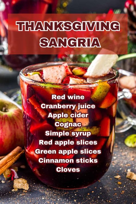 A vibrant pitcher of Thanksgiving Sangria filled with fresh fruit slices and warm spices, perfect for holiday gatherings. Wine For Thanksgiving Dinner, Sangria Recipes Thanksgiving, Spiced Sangria Recipe, Boozy Thanksgiving Drinks, Holiday Drinks Nonalcoholic Thanksgiving, Thanksgiving Drink Recipes Alcoholic, Thanksgiving Sangria Recipes, Festive Sangria, Thanksgiving Alcohol