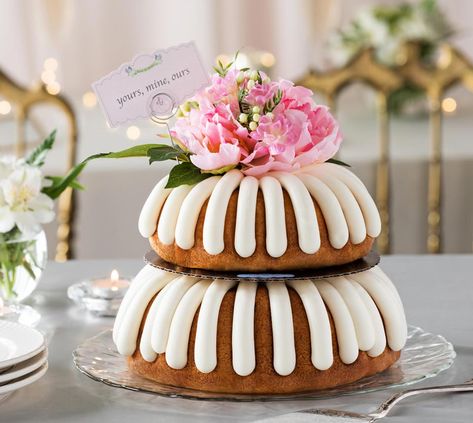 A two-tiered bundt cake with plates and a cake server Nursing Cake, Inside Cake, Nothing Bundt, Cake Tower, Nothing Bundt Cakes, Cake Liner, Lemon Bundt Cake, Cake Sizes, Cake Delivery