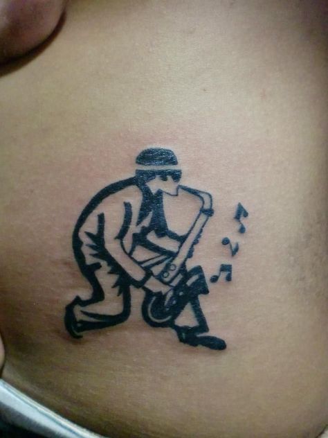 ska tattoo Ska Tattoo Ideas, Jazzy Tattoo, Sax Tattoo, Cliff Tattoo, Saxophone Tattoo, Rasta Tattoo, Skinhead Tattoos, Ska Music, Guitar Tattoo