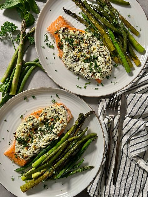 DIRECTIONS1. Preheat oven to 425F°.2. Place the goat cheese into a bowl and bring to room temperature. S&P to taste. Add zest of 1/2 lemon and chopped spinach. Mix well.3. Oil a large sheet pan. Place salmon filets in the middle. Using a paring knife, make vertical slits in each of the filets (you can cut right through the fish, leaving about 1 inch at the top and bottom intact. Stuff about 1/3 of goat cheese mixture into the middle of each of the filets. Place the asparagus and green beans arou Salmon With Goat Cheese, Goat Cheese Salmon, Salmon Goat Cheese, Salmon Filets, Salmon Spinach, Easy Salmon, Salmon Filet, Chopped Spinach, Paring Knife