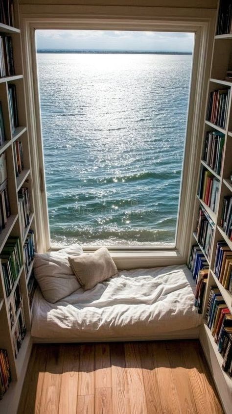 This serene reading nook features a window seat with soft cushions and a stunning view of the ocean, inviting relaxation stock photos Reading Room With Windows, Windowsill Seat, Window Sitting Ideas, Aesthetic Window Seat, Reading Corner Chair, Window Reading Nook, Window Seat Living Room, Reading Nook Window, Outdoor Reading Nooks