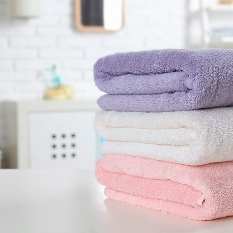 Here's Why You Shouldn't Use Fabric Softener on Towels Yard Sale Display, Washer Pedestal, Dryer Duct, Washing Towels, Liquid Fabric Softener, Dryer Vent, Vinegar Cleaning, Dryer Balls, New Africa