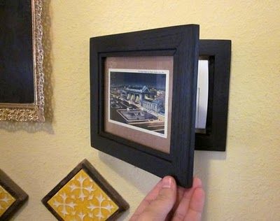 How to hide your home alarm... you know, the one that doesn't match any of your decor.  DIY home decor Thermostat Frame, Hide Thermostat, Hinged Picture Frame, Thermostat Cover, Bungalow Interior, Home Alarm, Art Frames, Big House, Home Security Systems