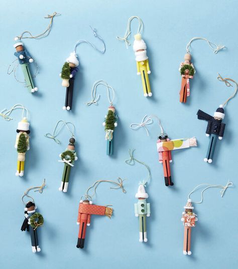 How To Make Clothespin People Holiday Ornaments Online | JOANN Clothespin Angel Ornaments, Clothes Pin People, Old Fashioned Clothespin Crafts, Clothes Pin Stars Christmas Ornament, Close Pin Ornaments, Clothespin People Ornaments, Clothes Pin Ornaments Christmas, Clothespin Christmas Craft, Clothespin Dolls Christmas