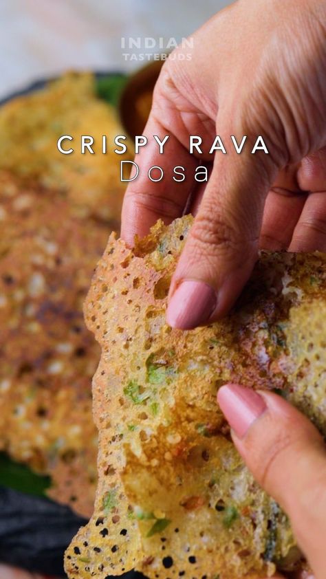 Instant Crispy Rava dosa 😍 Recipe: 1/2 cup rava/ semolina 1/2 cup rice flour 1/4 cup maida/AP flour salt to taste 3 cups water 1 red green chilli chopped 1 inch ginger grated 10 curry leaves chopped 1 tsp cumin seeds Few coriander leaves 1 onion finely chopped Ghee - In a big bowl add water, rava, rice flour, Maida, curry leaves, ginger, chilli, salt, cumin seeds and coriander leaves. - Give it all a good mix. Cover and let it rest for 15 minutes. - Heat an Iron pan or nonstick pan. Sprinkle ch Rava Dosa, Break Fast, Dosa Recipe, Cumin Seeds, Video Creator, Coriander Leaves, Green Chilli, Big Bowl, Recipe Video