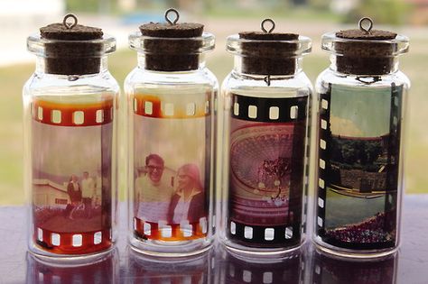 photo negatives in bottles Film Negatives Crafts, Photo Negatives Crafts, Things To Do With Film Negatives, Film Negatives Decor, Film Negatives Aesthetic, Film Negative Crafts, Film Negatives Art Ideas, Film Negatives Art, Upcycle Film Negatives