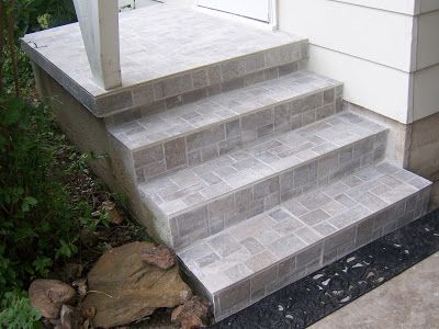 Professionally installed porcelain tile covers old concrete steps. Tiling Stairs, Tiles For Stairs, Staircase Carpet, Tile Patio, Cement Steps, House Steps, Entry Steps, Outside Steps, House Entry