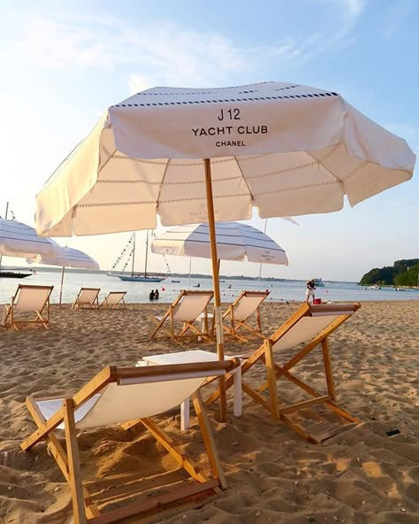 J12 YACHT CLUB, (SUNSET BEACH HOTEL), Shore Road, Shelter Island Heights, New York, USA, "Chanel beach umbrellas cover the sprawling coastline on Crescent Beach celebrating Chanel's iconic J12 watch",  photo by Tall Paul?, pinned by Ton van der Veer Kids Beach Chair, Swimming Pool Chair, Rattan Beach Chair, Chanel Beach, Single Summer, Lounger Chair, Pool Lounge Chairs, Pool Chairs, Pool Outdoor