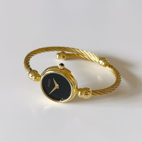 SOLD** Gucci Black dial gold plated bangle watch from the 90s Gucci Bangle Watch, Jewelry 101, Bangle Watches, Watches Luxury, Gold Plated Bangles, Womens Watches Luxury, Classy Jewelry, Jewelry Lookbook, Gucci Black