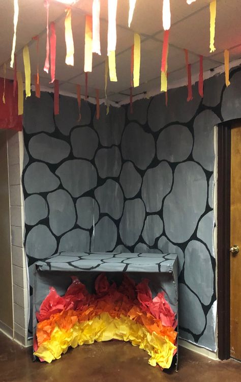 Love the way the Bible lesson themes are woven into the overall castle decor. See how well the lesson from session one, Shadrach, Meshach, and Abednego Stand True comes alive. Use gray and black paints to carry out the castle wall rock pattern. Create a large furnace by using a large cardboard box. Cover it with the castle paper created for the walls. Make the flames using red, orange and yellow colored tissue papers and glue. Crumple up paper before glue is added to give the look of flames. Castle Decorations For Classroom, Medieval Vbs Decorations, Vbs Castle Theme Decorating Ideas, Castle Vbs Decorations, Keepers Of The Kingdom Vbs Decorations, Kingdom Vbs Decorations, Kingdom Vbs Crafts, Keepers Of The Kingdom Vbs, Castle Theme Classroom