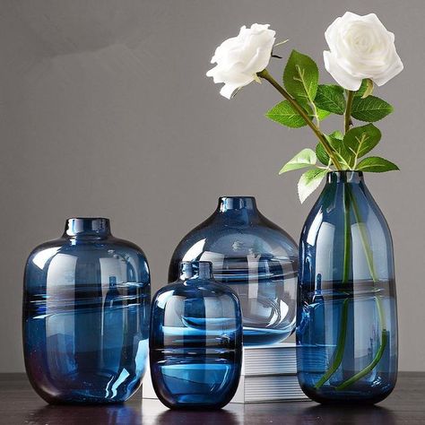 Our Minimalist Clear Glass Vases are a perfect match for the Nordic design trends of the moment. Rendered in sheer glass with clean and sleek lines, our modern glass tabletop vases come in three colors and four different shapes and sizes. Whether clustered together or displayed separately, these tabletop glass vases Nordic Style Living Room, Blue Vases, Glass Vase Decor, Vase Transparent, Blue Glass Vase, Vases For Sale, Clear Glass Vases, Impressionist Art, Pattern Glass