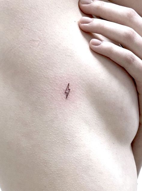 38 Small Meaningful Tattoos That Are Permanent Reminders Sobering Tattoos, Small Tattoos Freedom, Yes Please Tattoo, Tatoos Small Meaningful For Loss, Cute Patch Work Tattoos, Lightning Bolt Meaning, Freedom Tattoo Ideas For Women, Divorce Tattoos For Women, Lightning Bolt Tattoo Meaning