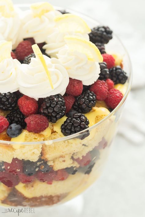 This Lemon Berry Trifle is perfectly tart and sweet, with a citrusy lemon cake, vanilla pudding, whipped cream and a ... Yogurt Lemon Cake, Summer Berry Trifle Recipe, Lemon Berry Trifle, Vanilla Dessert Recipes, Pudding Whipped Cream, Lemon Trifle, Trifle Recipes Easy, Vanilla Desserts, Berry Dessert Recipes