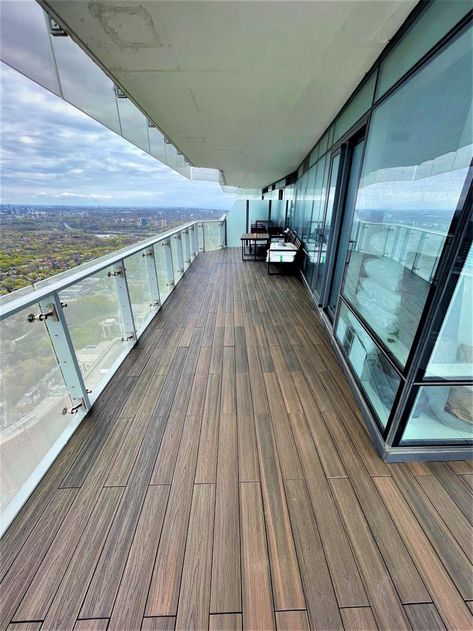 Our platinum series plank flooring is created with advanced technology and looks like a traditional wood deck. Its interlocking floating floor system provides a seamless finish. Contact us today for a free consultation to get started on upgrading your balcony flooring. https://zurl.co/g759 #BalconyFlooring #FlooringInstallation #BalconyMakeover #GTALiving #CondoLiving #OutdoorLivingSpace #UrbanBalcony #CondoBalcony #BalconyLife Building Balcony, Condo Balcony, Wood Plank Flooring, Balcony Flooring, Floating Floor, Condo Living, Wood Deck, Plank Flooring, Floor Installation