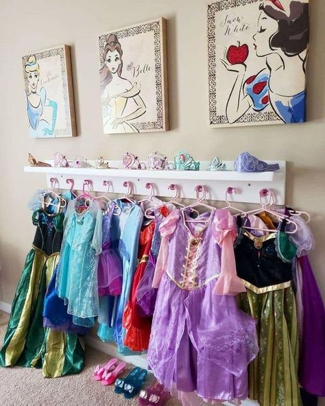 Dress Up Tiara Storage, Princess Dress Storage Ideas, Princess Dress Hooks, Hang Princess Dresses, Playroom Dressup Corner, Disney Princess Playroom, Princess Dress Organization, Princess Dress Storage, Girl Dress Up Station