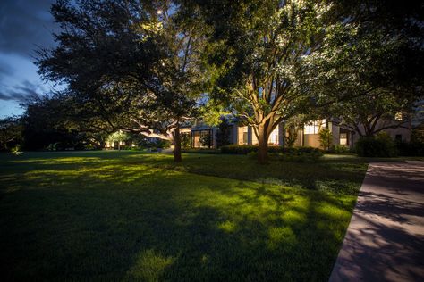 One of our favorite lighting techniques to use is moonlighting. For homes with large sweeping trees, we install downlights high up in the branches of the tree to create a beautiful moonlighting effect. At night, the lights mimic the natural glow of the moon and cast shadows that dance across the landscape below. This subtle lighting technique instantly elevates any outdoor environment adding an elegant soft glow to your home.  Contact us to discover the perfect lighting solution for your home! Moonlighting Landscape Lighting, Tree Uplighting, Residential Lighting Design, Exterior Lighting Design, Landscaping Trees, Landscape Lighting Design, Lighting Techniques, Sky Landscape, Outdoor Landscape Lighting