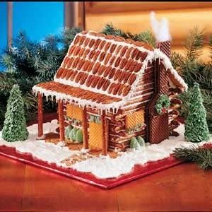 Pretzel Log Cabin Recipe: How to Make It Pretzel Rod Log Cabin, Log Gingerbread House Ideas, Gingerbread House Pretzels, Pretzel Gingerbread House Log Cabins, Gingerbread House Ideas Log Cabin, Pretzel Cabin Christmas, Pretzel House Log Cabins, Pretzel Log Cabin Christmas, Gingerbread House Log Cabin