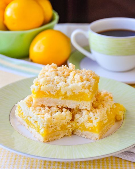 Coconut Lemon Crumble Bars. A 35+ year old family recipe that combines coconut and tangy lemon filling in a buttery crumble bar cookie. Freezes quite well too. #CookieBars Coconut Lemon Squares, Squares And Bars Recipes That Freeze Well, Bars That Freeze Well, Cakes That Freeze Well, Desserts That Freeze Well, Christmas Squares And Bars, Lemon Crumble Bars, Lemon Crumble, Crumb Bars