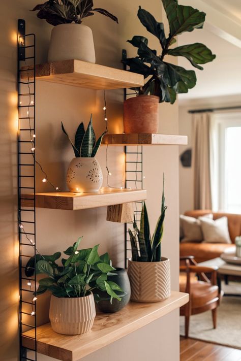 Elevate your home decor with a rustic-inspired plant shelf. Natural wood finishes, vibrant potted plants, and charming planters blend seamlessly to create a stunning living room centerpiece. #RusticPlantShelf #IndoorGreenery #NaturalHomeDecor #RusticHomeStyle #EcoFriendlyLiving #CozyPlantDecor #WoodenShelvesDesign #RusticVibes #IndoorPlantIdeas #WarmLivingSpace House Interior Plants Living Rooms, Plant Vibes Aesthetic, Plant Shelf Bedroom, Bedroom Ideas Shelves, Plant Apartment Aesthetic, Plant Shelves Bedroom, Plant Wall Shelf Ideas, Plant Wall Ideas Indoor, Plant Bookshelf