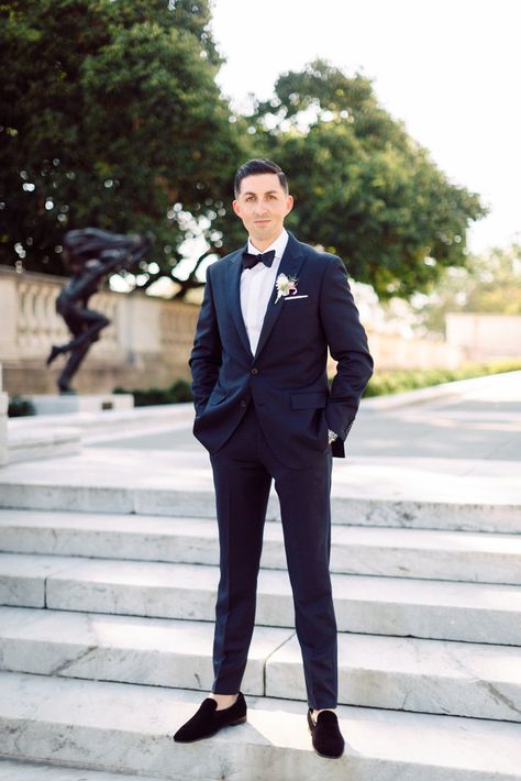 Navy suit for the groom #navysuit #groomsuit #weddingshoes #nosocks #bowtie Navy Blue Suit With Bow Tie, Navy Suit With Bow Tie, Navy Wedding Suit Groom, Mens Wedding Suits Navy, Dark Navy Suit, Mens Navy Suit, Classic Vintage Wedding, Navy Bow Tie, Navy Suit Wedding