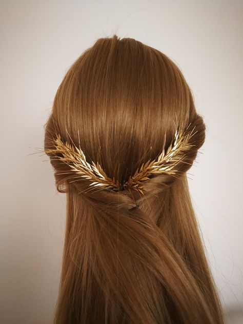 "Wheat is a timeless symbol of the bounty of nature and the golden days of harvest. Adding this symbol to one's wedding day is really meaningful. This piece is easy to wear. Easily be shaped for a comfortable fit. This item is handmade. The price is valid for 2pcs. Our Blé No.1 bridal hair piece is perfectly matching with our following style: **Blé No.2 - Gold wheat bracelet, Bridal bracelet , Wedding jewelry https://www.etsy.com/listing/685890202/ble-no2-gold-wheat-bracelet-bridal?ref=shop_home Wheat Wedding, Gold Wedding Hair Piece, Gold Hair Piece, Goddess Crown, Wedding Hair Jewelry, Wire Headband, Bridal Hair Piece, Hair Jewellery, Golden Crown