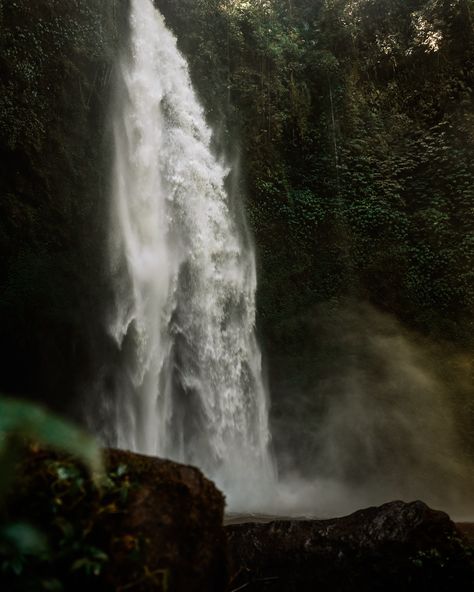 Discovering Nungnung Waterfall 💧🌿 Nestled in the heart of Bali, Nungnung Waterfall is one of the island’s hidden gems. Standing at an impressive 50 meters, this powerful cascade offers a breathtaking sight, with lush greenery surrounding the falls. After a steep trek down, I couldn’t resist taking a dip in the crystal-clear waters—an invigorating experience in such a serene, natural setting✨ Have you experienced the raw power of Nungnung Waterfall yet? . . . #NungnungWaterfall #BaliNatur... Island Waterfall, Waterfall Aesthetic, Falls Aesthetic, Hidden Waterfall, Unique Stays, Magical Landscapes, Rock Waterfall, Oc Aesthetic, Disney Pixar Movies