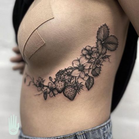 Hamsa Tattoo on Instagram: "How incredible is this strawberry piece!? Made by @bobbiedazzlertattoo who pieced this together on the body to make sure this fit absolutely perfectly!" Under Belly Tattoo Woman, Plants Around Knee Tattoo, Skull Strawberry Tattoo, Strawberry Spine Tattoo, Strawberry Mushroom Tattoo, Strawberry Skull Tattoo, Strawberry Hip Tattoo, Strawberry Bush Tattoo, Wild Strawberry Tattoo