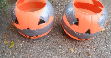 Easy and Cheap DIY Concrete Pumpkin Planter | Hometalk Cement Pumpkins, Candy Buckets, Hometalk Diy, Fall Crafting, Pumpkin Planter, Diy Concrete Planters, Candy Bucket, Plastic Pumpkins, Diy Concrete