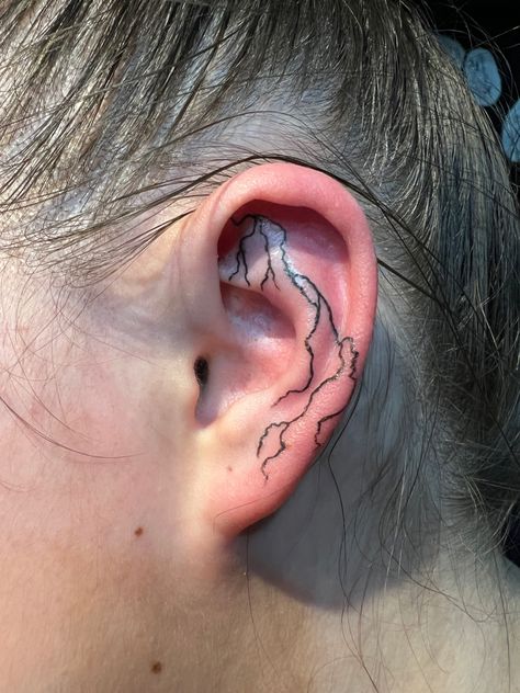 New tat Uv Ear Tattoo, Hand Tattoos Lightning, Lighting Tattoos, Inside Ear Tattoos, Lightning Tattoos, Star Tattoos Behind Ear, Behind Ear Tats, Inner Ear Tattoo, Blitz Tattoo