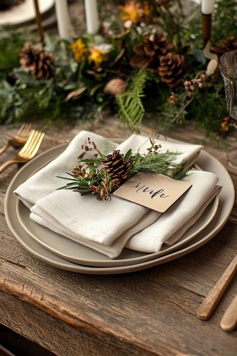 Add natural elements like greenery and wood to your Thanksgiving place settings for a warm, earthy feel. #ThanksgivingTable #PlaceSettings #NaturalStyle Rosemary Place Setting, Thanksgiving Place Settings, Holiday Place Settings, Place Settings Thanksgiving, Stunning Nature, Harvest Season, Christmas Table Settings, Table Setup, The Harvest