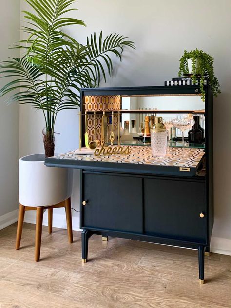 Add a touch of monochrome glam to your home with a bespoke cocktail cabinet 🖤🤍 Sleek Bar Unit, Vintage Bar Cabinet Ideas, Bar Furniture Cabinet, Home Bar Cabinet Ideas, Bar Cabinet Styling, Bar Cabinets For Home, Bar Cabinet Decor, Vintage Bar Cabinet, Mid Century Bar Cabinet