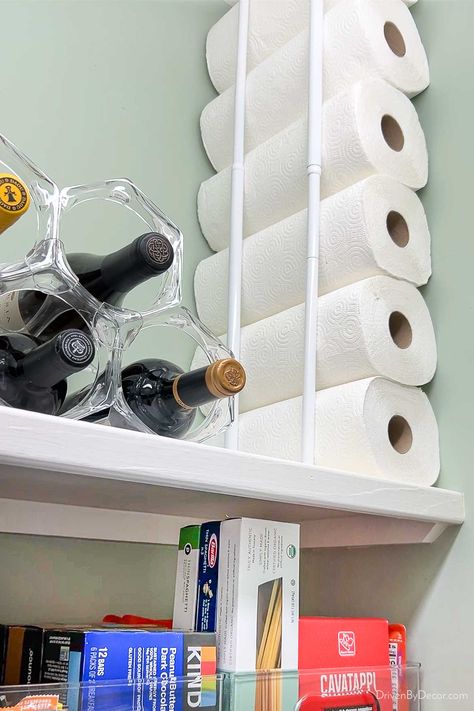 Paper towels stored vertically with use of tension rods Storing Paper Towels, Paper Towel Storage, Kitchen Cabinet Organization Ideas, Wicker Bar Stools, Utility Closet, Home Organization Ideas, Pan Storage, Driven By Decor, Tension Rods