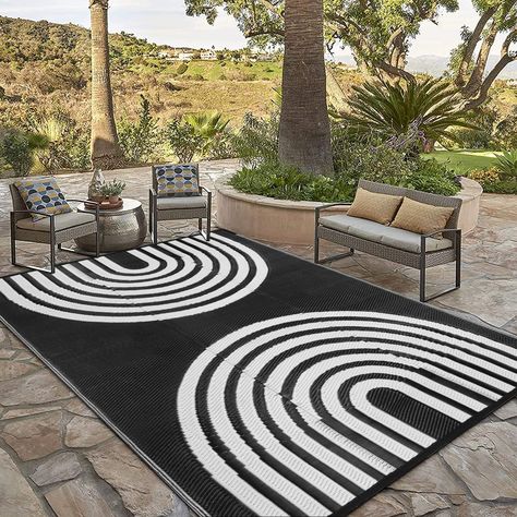 PRICES MAY VARY. ☀Unique Design: Our outdoor rug features a double rainbow pattern, simple and classic black and white design, easily match any of your patio furniture and outdoor space, complement your modern style. The reversible design gives two looks, and when one side of your rug wears down, just flip it over and it'll give your patio a whole new look. (Note: There may be some creases when first used, simply unfold the rug and lay it flat or press it with heavy object and it will recover fl Outside Rug, Straw Rug, Camping Rug, Balcony Pool, Porch Balcony, Boho Outdoor, Outdoor Rugs Patio, Camping Mat, Balcony Furniture