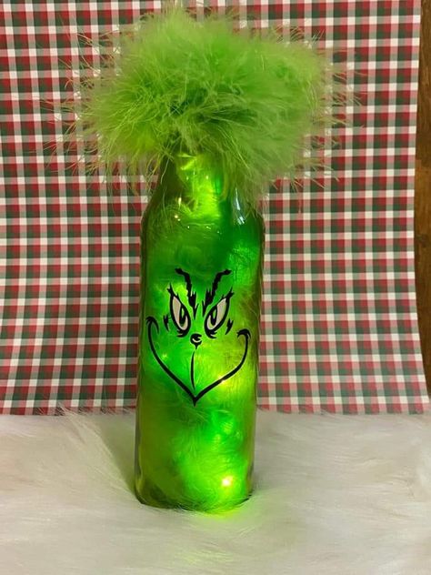 Wine Bottle Crafts For Christmas, Grinch Mason Jar Diy, Grinch Wine Bottle Crafts, Grinch Painted Wine Bottle, Grinch Snowglobe Tumbler, Painted Christmas Bottles With Lights, Christmas Party Decorations Diy, Creamer Bottles, Giant Christmas Ornaments