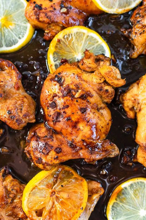 Honey garlic lemon pepper chicken thighs are a fresh, citrusy dish that will brighten up your dinnertime. Juicy chicken thighs are seasoned with a zesty lemon-pepper mixture, marinated in a garlic lemon sauce, and pan-seared to tender perfection. #chickenthighs #chicken #chickenrecipe #lemonpepperchicken #honeygarlicchicken #easydinner #weeknightdinner Honey Garlic Lemon Pepper Chicken, Lemon Pepper Chicken Thighs, Lemon Garlic Chicken Thighs, Cilantro Chicken, Lemon Garlic Chicken, Lemon Pepper Chicken, Pepper Chicken, Chicken Main Dishes, Lemon Sauce