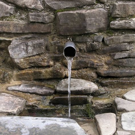 A spring box works as both a holding and settling tank. Water Collection System, Water Spring, Self Sufficient Homestead, Natural Spring Water, Natural Spring, Waterfalls Backyard, Survival Life Hacks, Water Collection, Water System