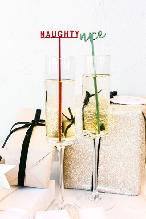 Naughty or Nice? Claim your cup with a cute little Christmas drink stirrer! Perfect for Christmas parties, intimate events, and the holidays, these unique drink tags make the most adorable embellishment to your cocktails. Simply pop them into a champagne flute or wine glass and use them as place cards or party favors for your guests!Set of 12 // 2 stirrers per designMeasurements: Approximately 2-2.5" W x 6.5" H Material: AcrylicSafe to use in hot and cold beveragesCare instructions:Kindly hand w Simple Christmas Party Decor, Christmas Drink Stirrers, Christmas Bachelorette Party, Christmas Engagement Party, Intimate Events, Christmas Theme Party, Elegant Christmas Party, Christmas Bridal Showers, Drink Stirrer